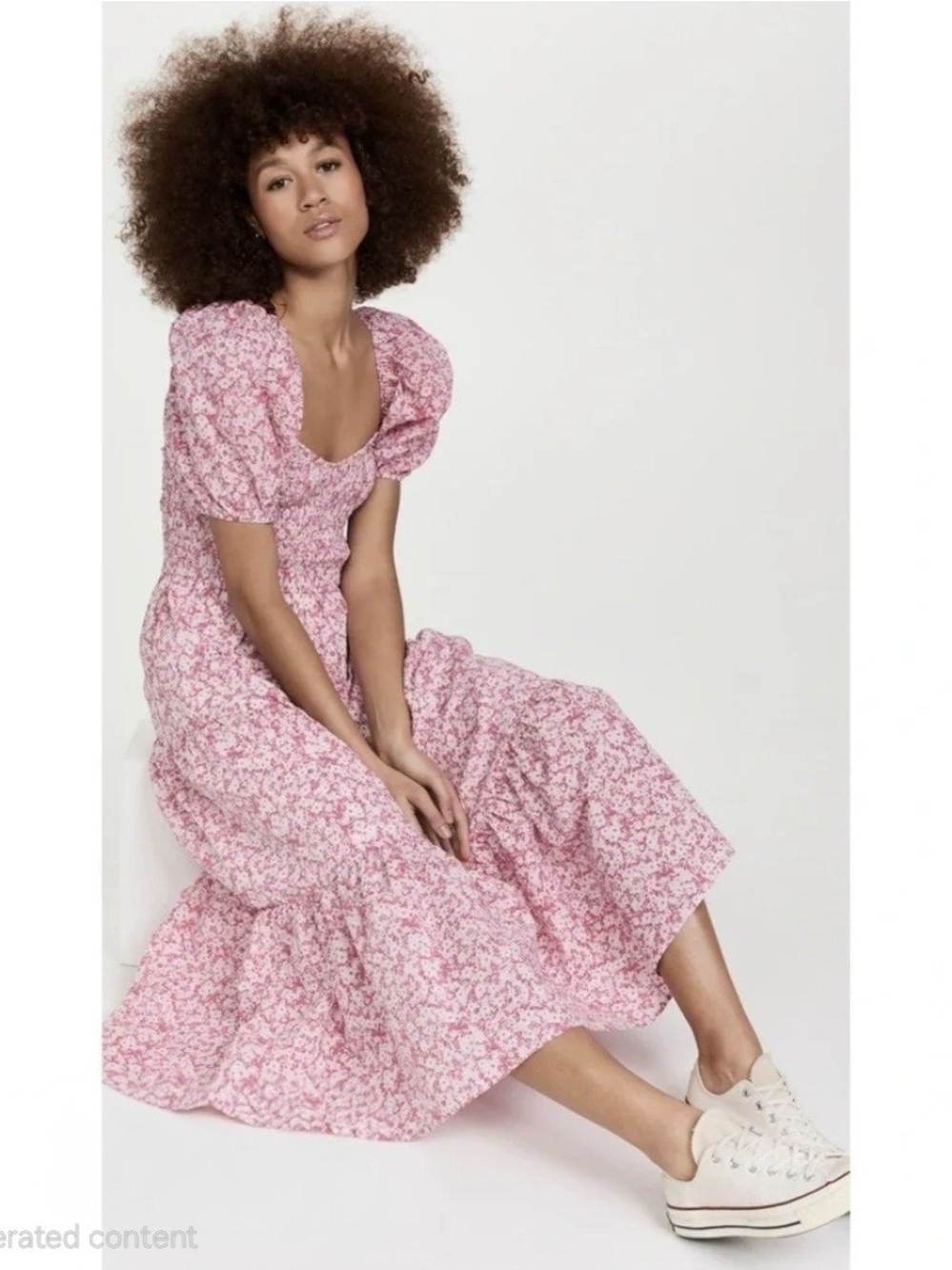 Moon River Anthropologie floral dress features a smocked bodice and dramatic puf